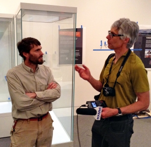 Earth sciences curator Pat Druckenmiller talks to a reporter about the museum's new exhibit.